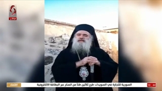 من رحاب مدینة #القدس الجریحة المطران عطالله حنّا رئیس أساقفة الروم الأرثوذکس یهنئ  السوریین