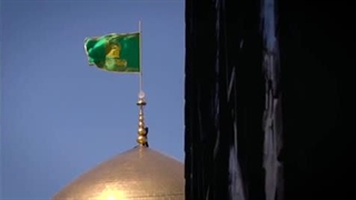 مراسم تعویض پرچم گنبد منور رضوی در آستانه دهه کرامت