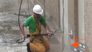 نماشویی ساختمان توسط تیم حرفه ای با طناب