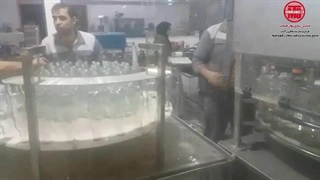 دستگاه پرکن شیشه 10 نازل درب پیلفرپروف توان صنعت | 09152000050